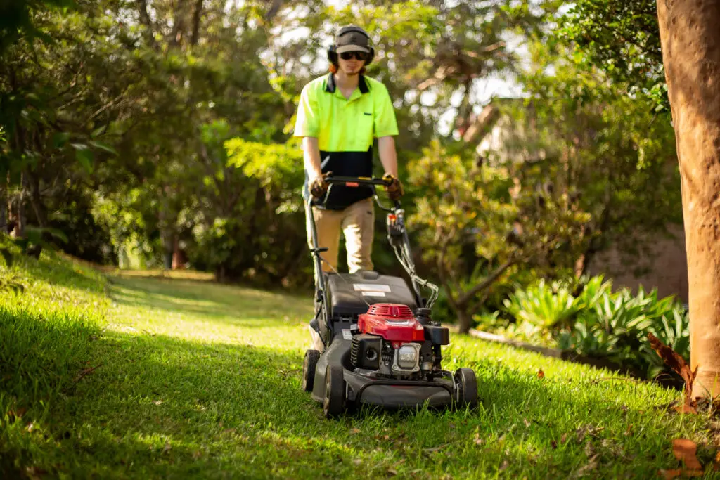 man mowing grass